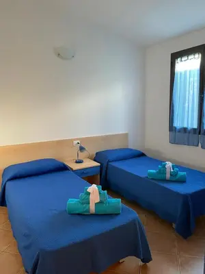 Letto o letti in una camera di Case Vacanze Sole e Luna