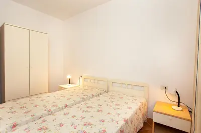 Letto o letti in una camera di Appartamento Belvedere Citai