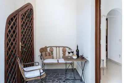 Area soggiorno di Domo Mea Terra e Domo Mea Chelu - Comfort nel centro storico di Orosei