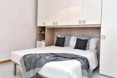 Letto o letti in una camera di Residence Chiaro di Luna