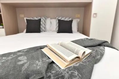 Letto o letti in una camera di Residence Chiaro di Luna