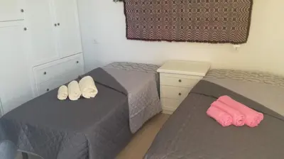 Letto o letti in una camera di Casa Speranza