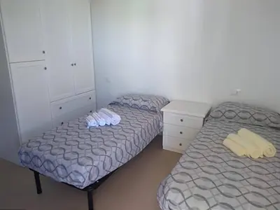 Letto o letti in una camera di Casa Speranza