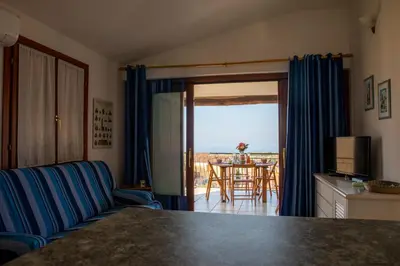 Area soggiorno di APP.TO VIA MARE - BUDONI SWEET HOME