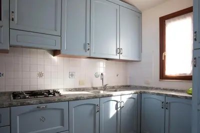 Cucina o angolo cottura di APP.TO VIA MARE - BUDONI SWEET HOME