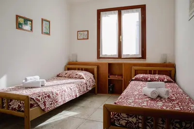 Letto o letti in una camera di APP.TO VIA MARE - BUDONI SWEET HOME