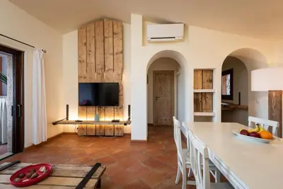 TV o dispositivi per l'intrattenimento presso Le case del golfo - Your House in Sardinia