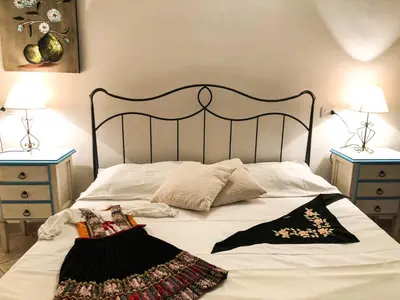 Letto o letti in una camera di Sas Tilibbas-Ammentos Posada