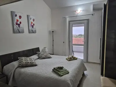 Letto o letti in una camera di Casa Elias