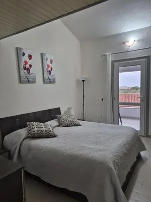 Letto o letti in una camera di Casa Elias