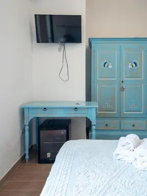 Letto o letti in una camera di Affittacamere Zia Maria