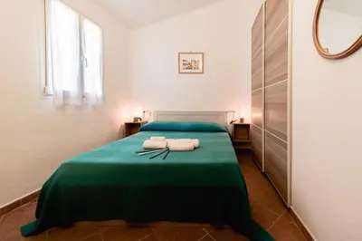 Letto o letti in una camera di Fronte Mare Premium