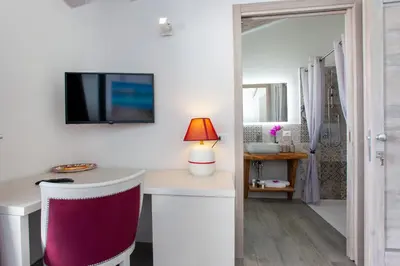 TV o dispositivi per l'intrattenimento presso Villa Elisir Luxury - Le Residenze del Mare