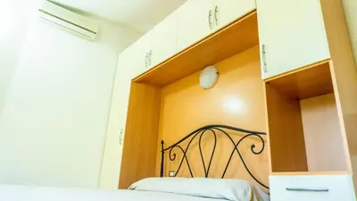 Letto o letti in una camera di Appartamenti Dodi LT - PMS CaseVacanze