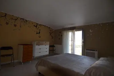 Letto o letti in una camera di Villetta con giardino in contesto riservato non lontana dal mare BEL01