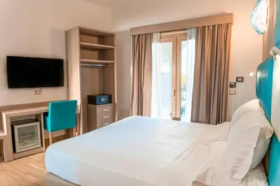 Letto o letti in una camera di AQUA SARDINIA boutique hotel