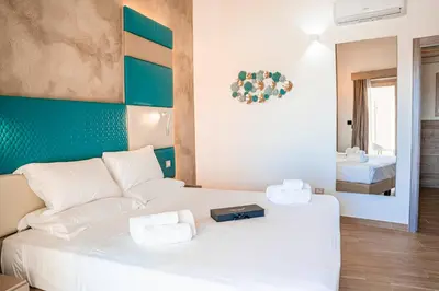 Letto o letti in una camera di AQUA SARDINIA boutique hotel