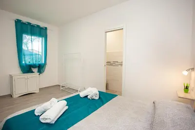 Letto o letti in una camera di Camere Tirreno 1