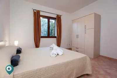Letto o letti in una camera di Arruli H1