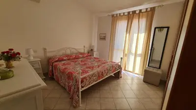 Letto o letti in una camera di La Coccinella