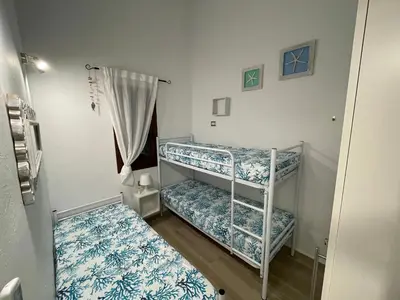 Letto o letti in una camera di Splendida Villetta San Teodoro