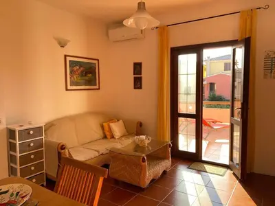 Area soggiorno di Comfy and bright apartment