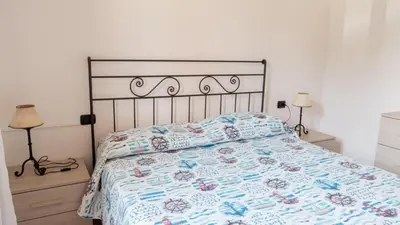 Letto o letti in una camera di La Cinta 2
