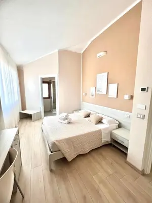 Letto o letti in una camera di InCentro - San Teodoro