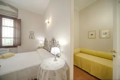 Letto o letti in una camera di B&B A casa di Teresa