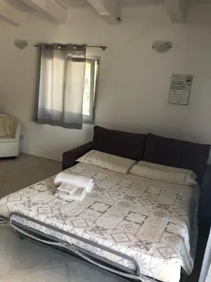 Letto o letti in una camera di Giorgia&Greta- relax casa vacanze