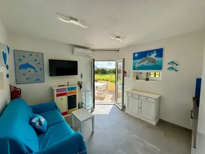 TV o dispositivi per l'intrattenimento presso Appartamenti delfini terza spiaggia