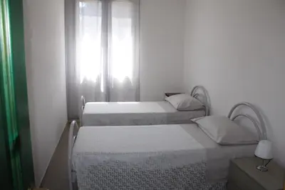 Letto o letti in una camera di Villa Cedrino Orosei