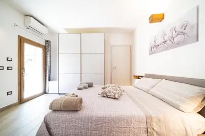 Letto o letti in una camera di B&B Gonare