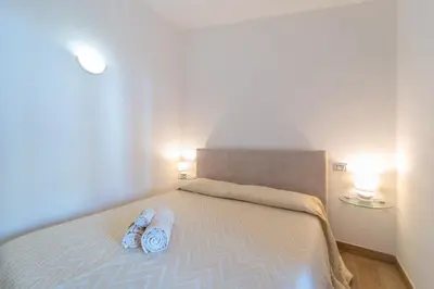 Letto o letti in una camera di Bilocale a un passo dal mare
