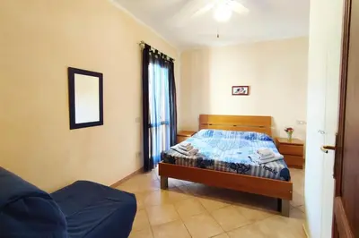 Letto o letti in una camera di Casa Paguro