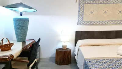 Letto o letti in una camera di Sole Matto Rooms