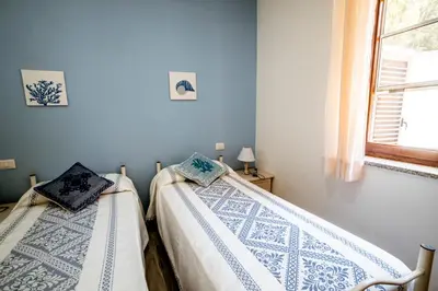 Letto o letti in una camera di Appartamento La Collinetta LT - PMS CaseVacanze