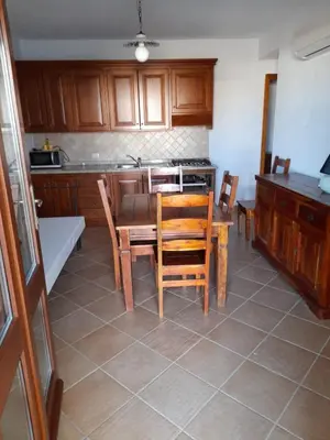 Cucina o angolo cottura di APPARTAMENTI BELLA VISTA SU TAVOLARA