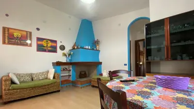 Area soggiorno di Manunta Holiday House - Maria - UINQ0474