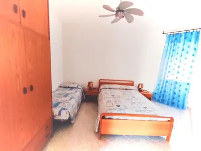 Letto o letti in una camera di Appartamento Marco Polo