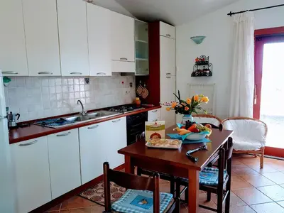 Cucina o angolo cottura di ROSA DEI VENTI - CASA LEVANTE - Sardegna - IUN R2403