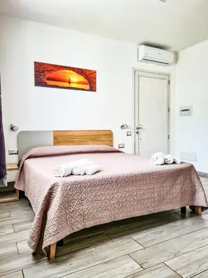 Letto o letti in una camera di Affittacamere Bellavista Posada