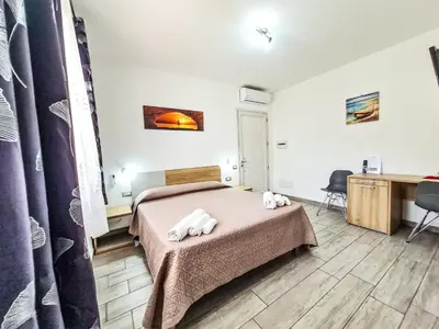 Letto o letti in una camera di Affittacamere Bellavista Posada