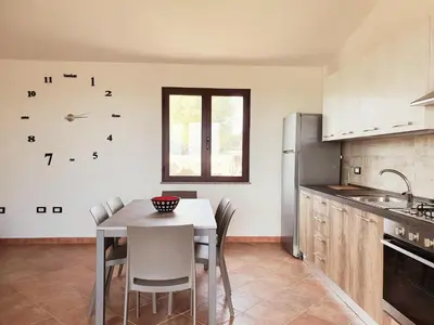 Cucina o angolo cottura di Las Cortesas - Villini indipendenti in mezzo alla campagna e a pochi chilometri da Orosei