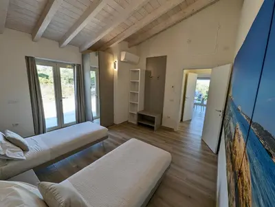 TV o dispositivi per l'intrattenimento presso Luxury Stunning Seaview Villa by SardiniaGem