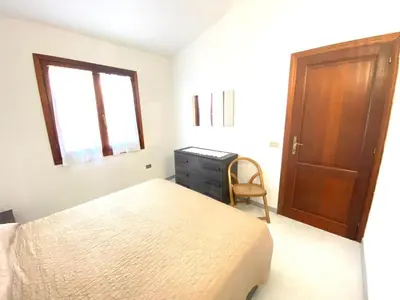 Letto o letti in una camera di Villino L'isuledda