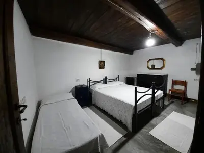Letto o letti in una camera di Domo Sedda