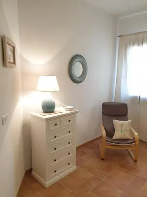 Area soggiorno di Capo Figari 9, Appartamento spazioso nel centro di Golfo Aranci con terrazza, Wi-Fi, parcheggio gratuito
