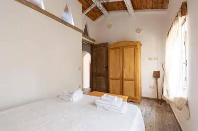Letto o letti in una camera di Villa Jumpadu