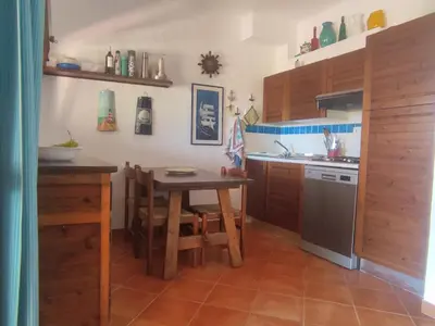Cucina o angolo cottura di SA MARINA- 200 METRI DAL MARE VISTA SU TAVOLARA!!!